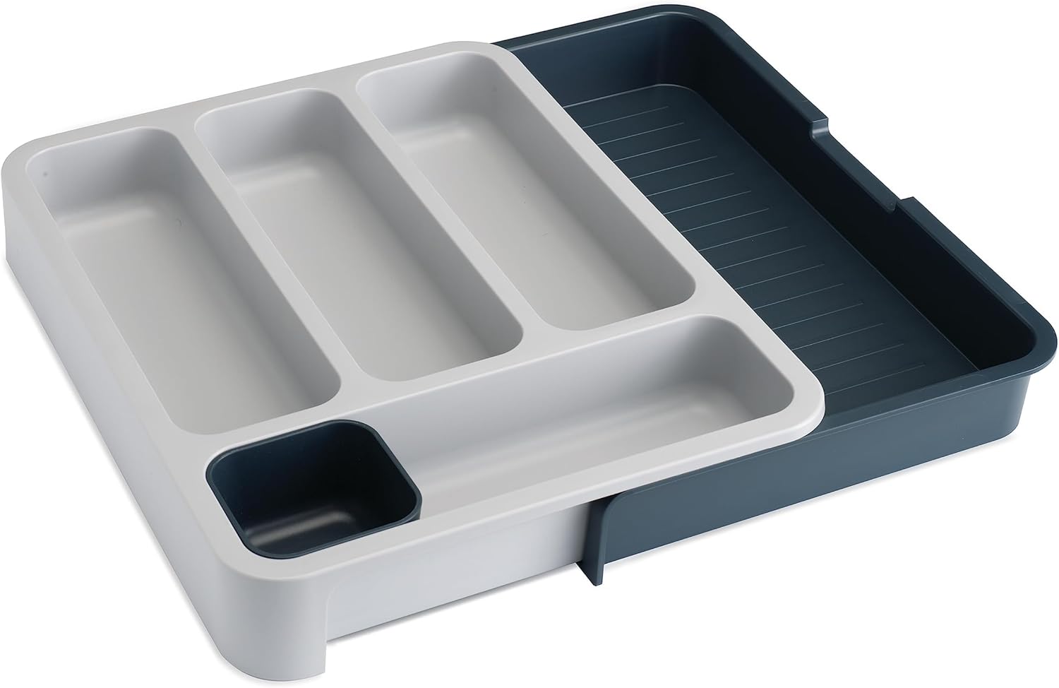 Expandable dark-gray six-compartment plastic cutlery drawer tray — compact empty tray