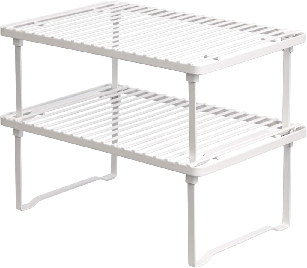 Set of two white stackable metal cabinet shelf risers — white two-tier set on a clean background