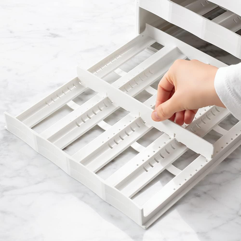 White adjustable pull-down spice organizer with drawer labels — adjustable divider detail