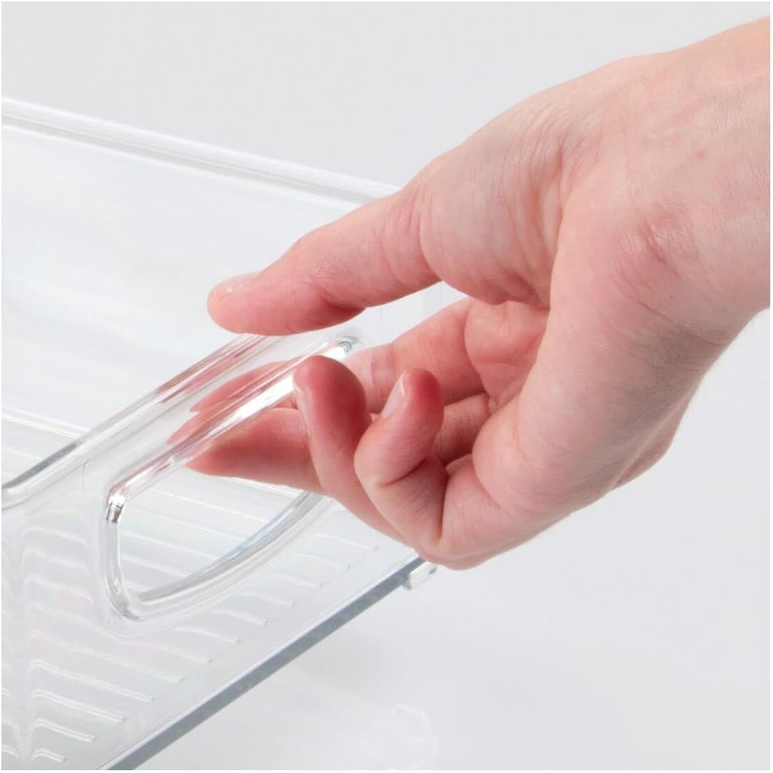 Two clear plastic handled storage bins for pantry or refrigerator organization — clear handle detail